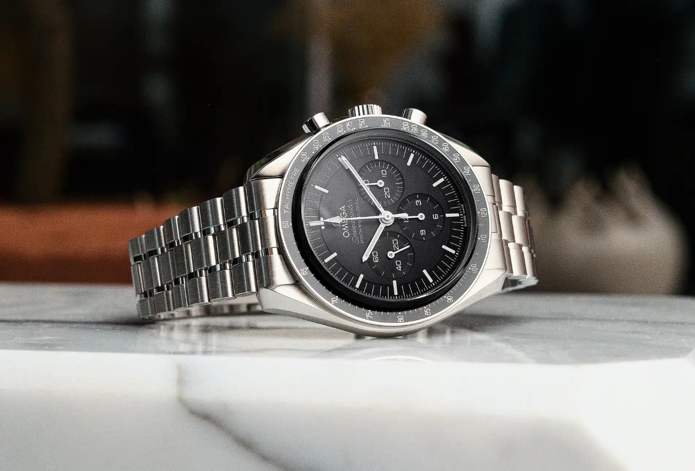 Black dial Omega Speedmaster Moonwatch replica watch on steel bracelet